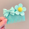 Green bow hair comb