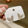 Color-preserved gold butterfly stud earrings
