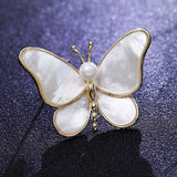 Spot wholesale brooches, high-end niche design, fashionable mother-of-pearl butterfly brooches, women's clothing accessories, pearl pins