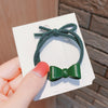 Dark green bow tie
