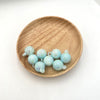 Hanging beads - smudged luminous - blue