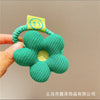Green cotton-filled flower hair rope