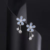 Drip oil blue flower stud earrings