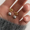 Pearl earrings gold color