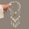 J74 rhinestone bow tie lily of the valley tassel