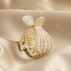 Palm pearl gold