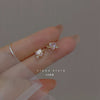 A pair of pink love earrings plated with 14k real gold and 925 silver needles