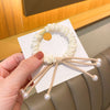 Off-white pearl knotted hair tie