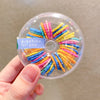 Box of 60 rainbow colored hair ties
