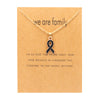 Gold card with black ribbon