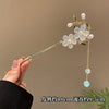 Picking honey - blue tassel