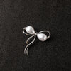Silver water drop bow