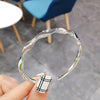 Open twist bracelet