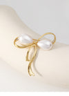 Golden water drop bow