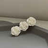 Three camellias