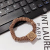 2# light coffee smiling face hair ring
