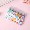 Rotating pen macarons in a box of six colors / oblique head
