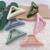 Gold powder triangle clip