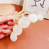 Pearl white five rings