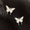 Silver stud earrings (one pair)