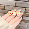 Three cherry hearts