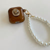 Headphone cover - retro beauty head - with pearl chain - transparent brown / airpods 1/2 generation