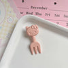 Light pink cat head fork