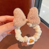 Brown hair tie with bow