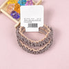 A pair of light gray lace hair ties