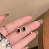 Black zircon stud earrings