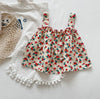 Flower top + white shorts / 90 yards