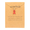 Gold card with red ribbon