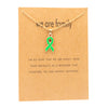 Gold card with green ribbon