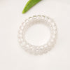 Transparent telephone cord hair tie-transparent