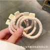 (beige) high stretch woven fabric label hair ties