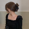 7# black plush grab clip.
