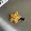 Star smiley face - yellow