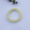 Frosted telephone cord hair ring - green polka dots