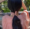 Thick pink butterfly clip