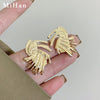 A pair of s925 silver needle gold stud earrings