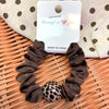 Leopard print [individual packaging on cardboard]