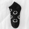A0431-4 black background full of smiling faces / one size fits all