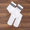 Black bars on white background / wrapped velvet stockings