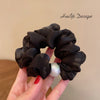 P100 black hair tie