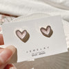 Pink heart stud earrings