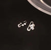 Asymmetric paperclip stud earrings