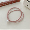 A bead [pink]