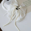 Beige-textured chiffon bow clip