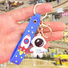 Astronaut keychain leather strap blue