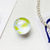 Crystal glass stand - round - earth green / transparent bracket